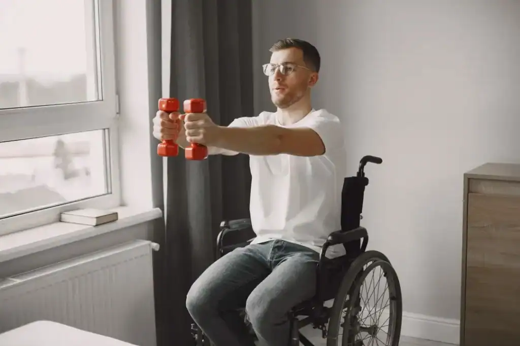 Empowering Weight Loss: A Comprehensive Guide for Individuals with Disabilities 1 Image of man doing exercise in his wheelchair to aid weight loss Nottingham