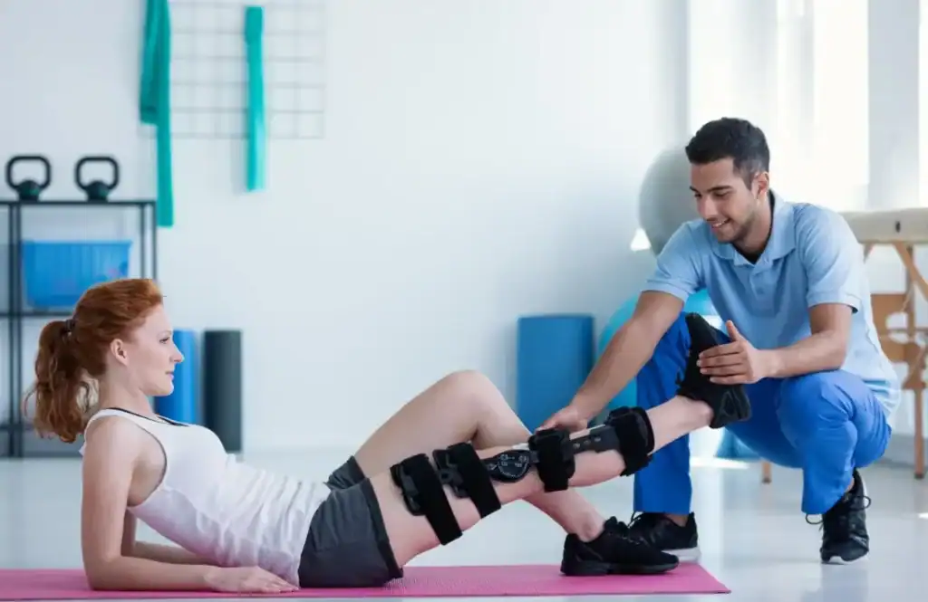 Debunking Meal Timing Myths: The Truth About Muscle Recovery 1 Woman having treatment to help muscle recovery Nottingham after an injury