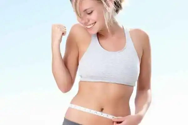 Unraveling the Mystery: Where Does the Body Fat Loss From First? 3 Image of woman happy with fat loss Nottingham